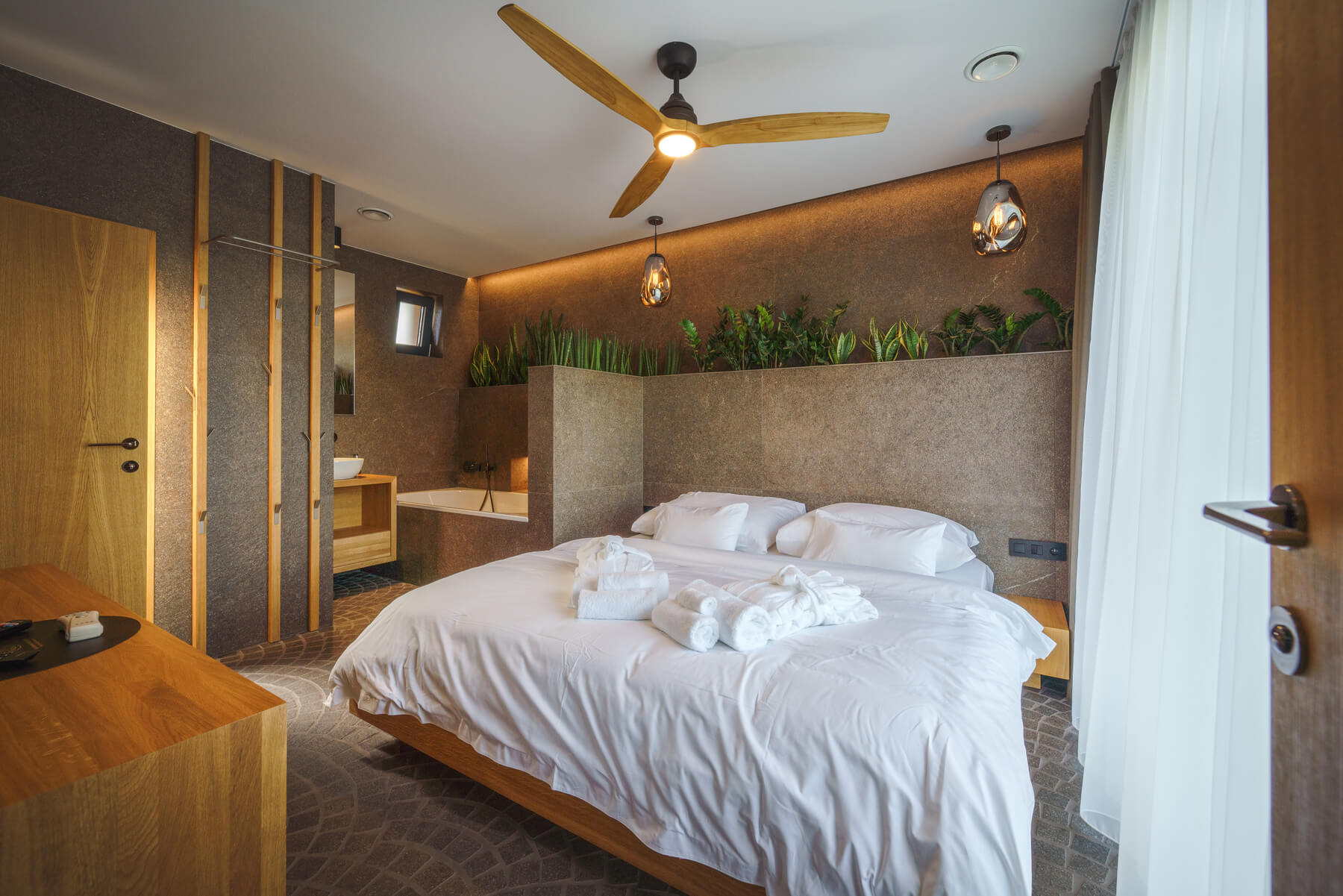 interior of modern bedroom suite with bath in luxu 2023 11 27 05 00 12 utc.jpeg
